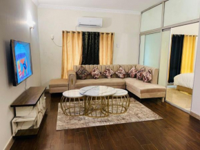 F-10 stylish studio apartment 1 bed dd tv lounge kitchen furnished